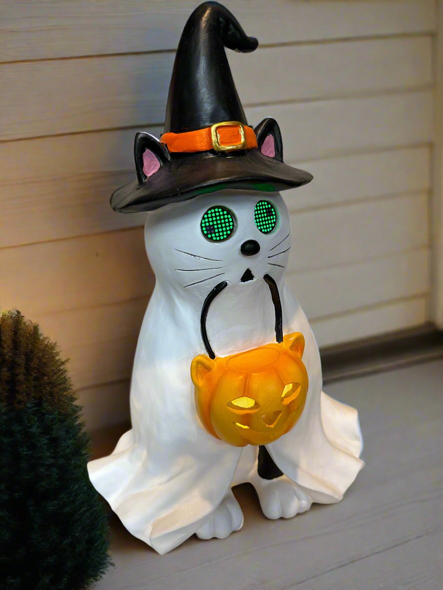 Cat In Ghost Costume With Witch Hat